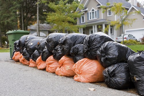 Professional furniture disposal team handling removal.